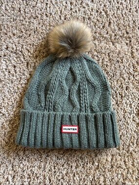 Hunter Women’s Olive Green Cable Knit Beanie with Faux Fur Pom